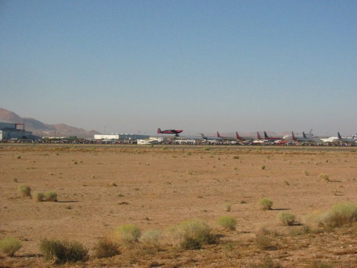 SpaceShipOne landing with Extra 300 keeping close watch