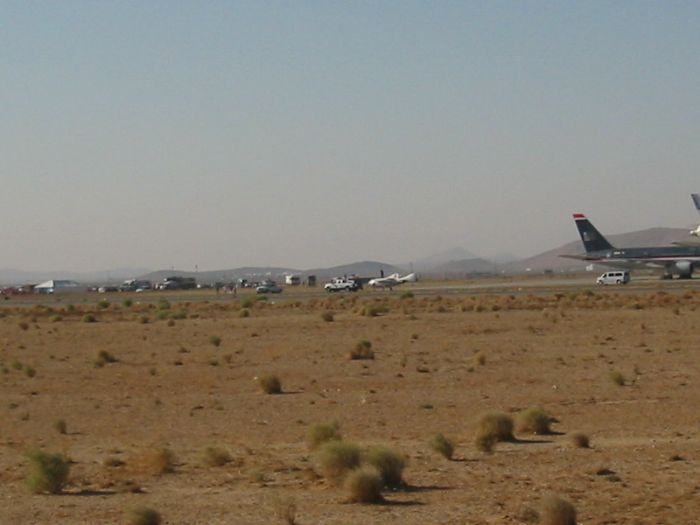 SpaceShipOne with Mike Melvill on top being towed toward the general public crowd (not seen in photo)