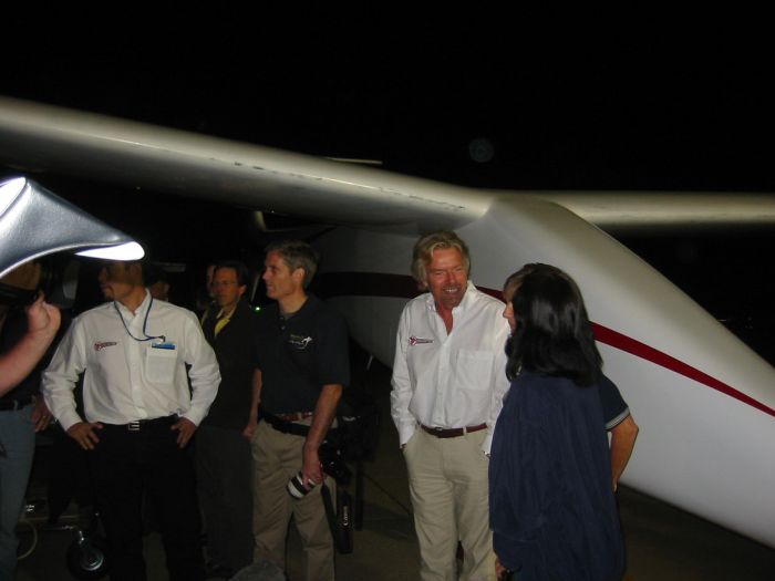 Sir Richard Branson talking with Brian Binnie's wife and Mike Melvill's wife