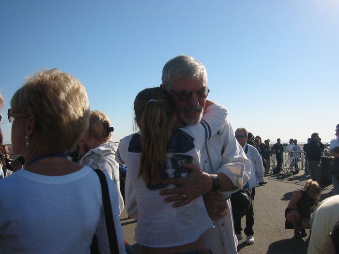 Dick Rutan hugging his granddaughter