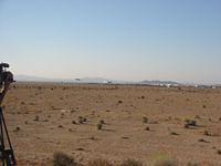 SpaceShipOne landing with Extra 300 keeping close watch