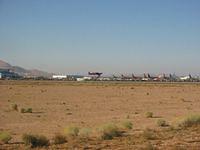 SpaceShipOne landing with Extra 300 keeping close watch