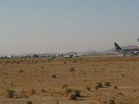 SpaceShipOne with Mike Melvill on top being towed toward the general public crowd (not seen in photo)