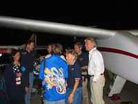 Brian Binnie's wife (in the American Flag shirt), Mike Melvill's wife, and Sir Richard Branson