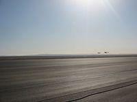 SpaceShipOne lands with Extra 300 close by keeping watch